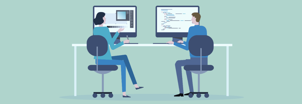 Person teaching another person at the computer